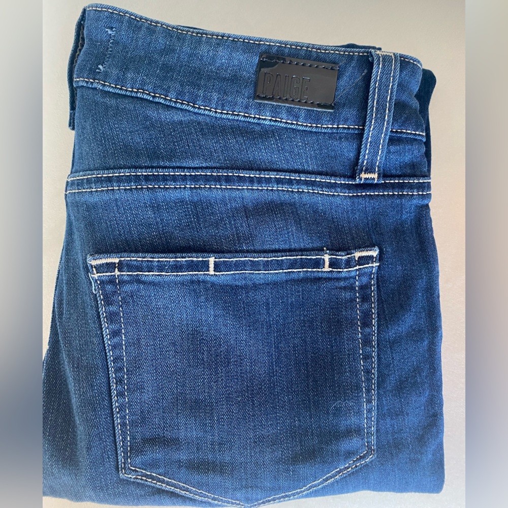 brand new never worn paige brand dark wash jeans. mid rise. size 25